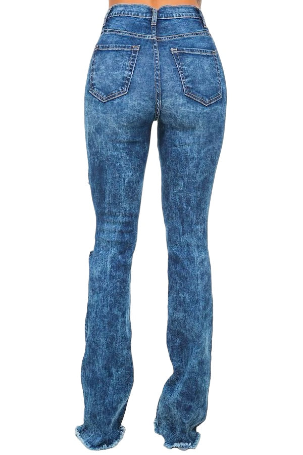 a woman wearing a pair of blue jeans