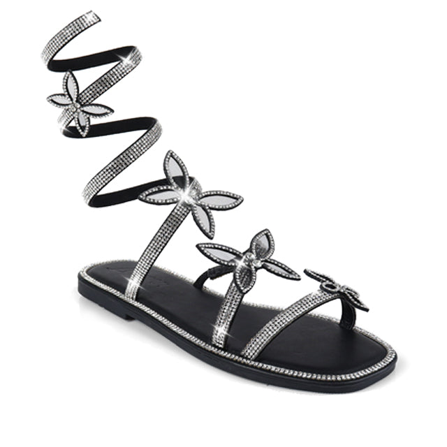 a woman's sandals with a flower decoration