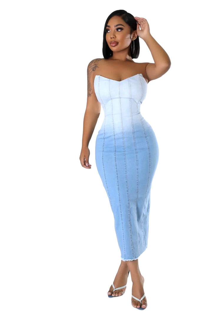 a woman in a blue and white dress