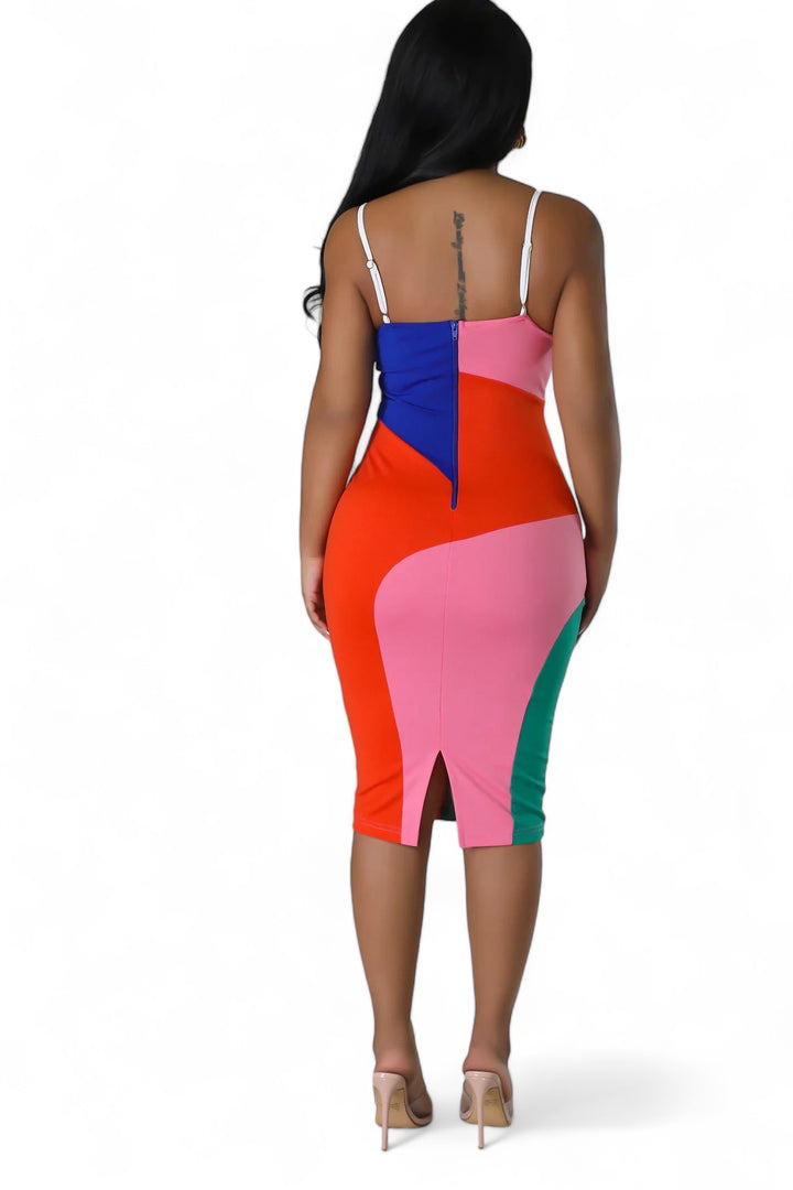 the back of a woman wearing a colorful dress