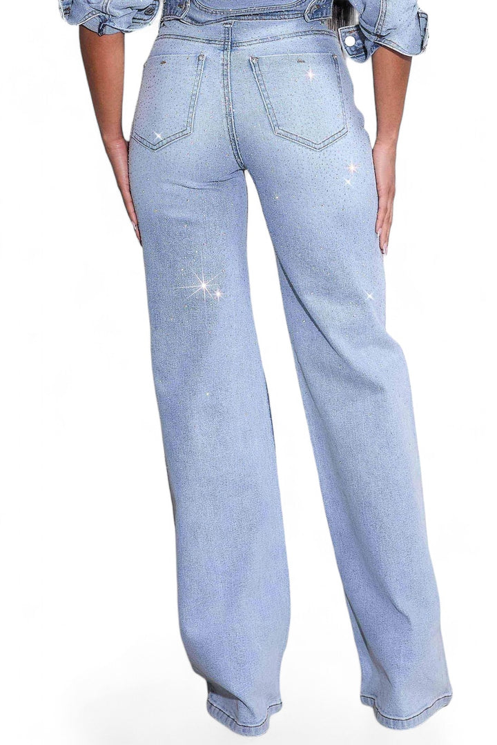 a woman wearing a pair of light blue jeans