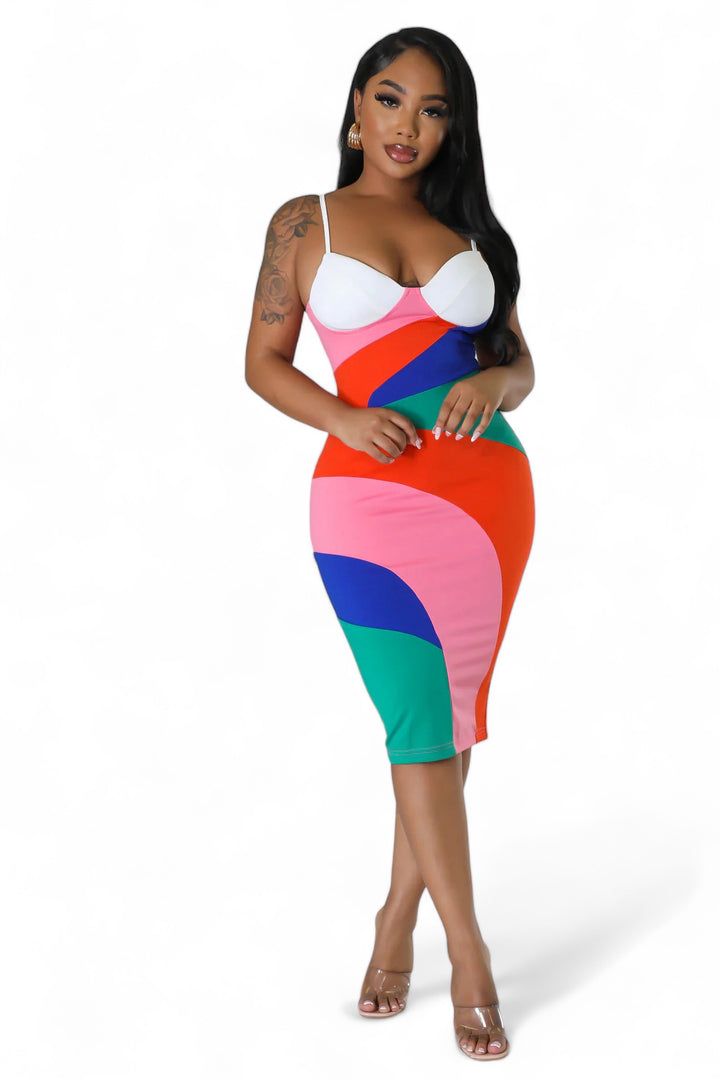 a woman in a colorful dress