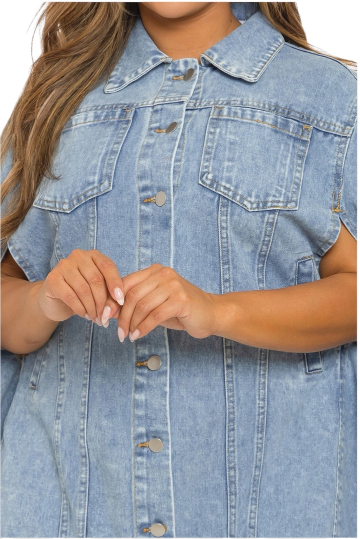 a woman wearing a jean jacket and jeans