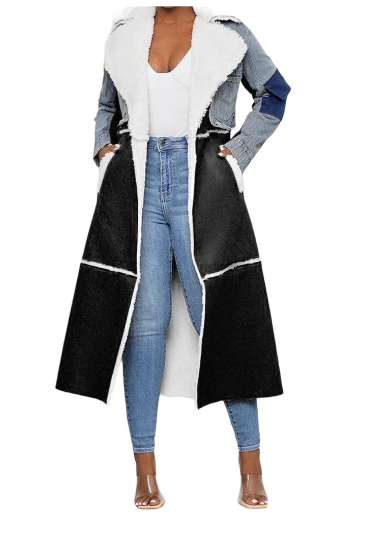 a woman wearing a black and white coat