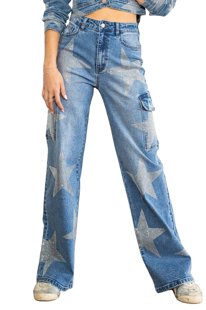 a woman wearing a pair of blue jeans with stars on them