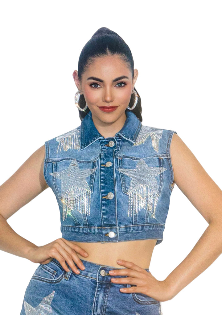 a woman wearing a jean jacket and skirt