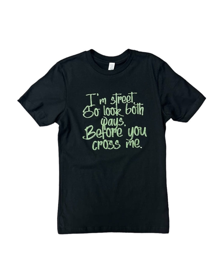 a black t - shirt with green writing on it