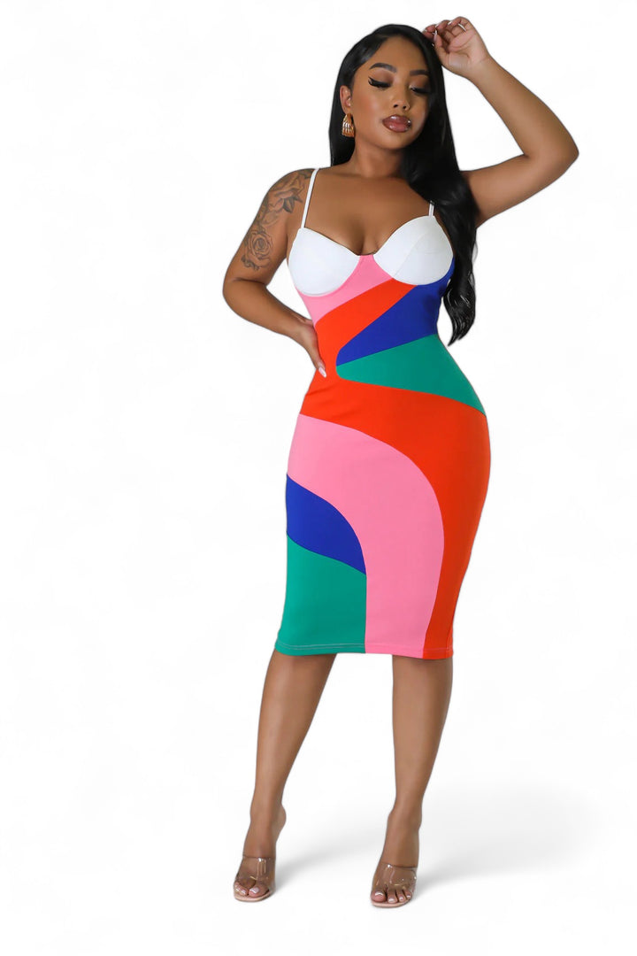 a woman in a colorful dress