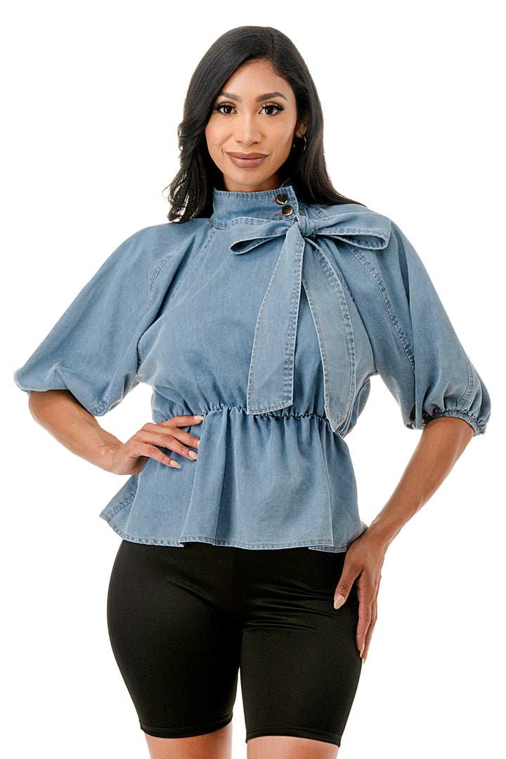 a woman posing for a picture with her hands on her hips