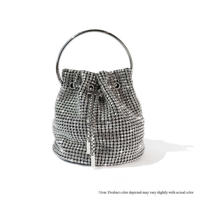 a handbag with a metal handle on a white background