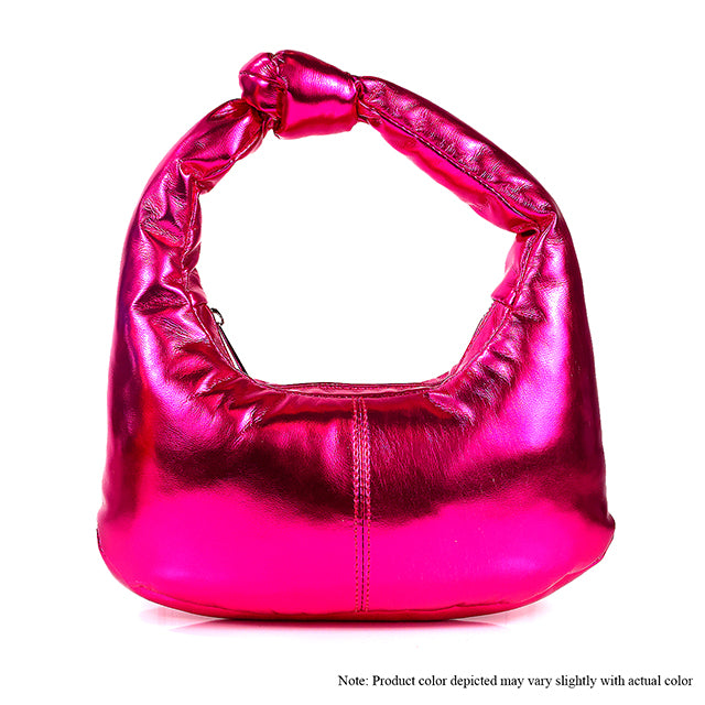 a pink purse with a bow on the handle