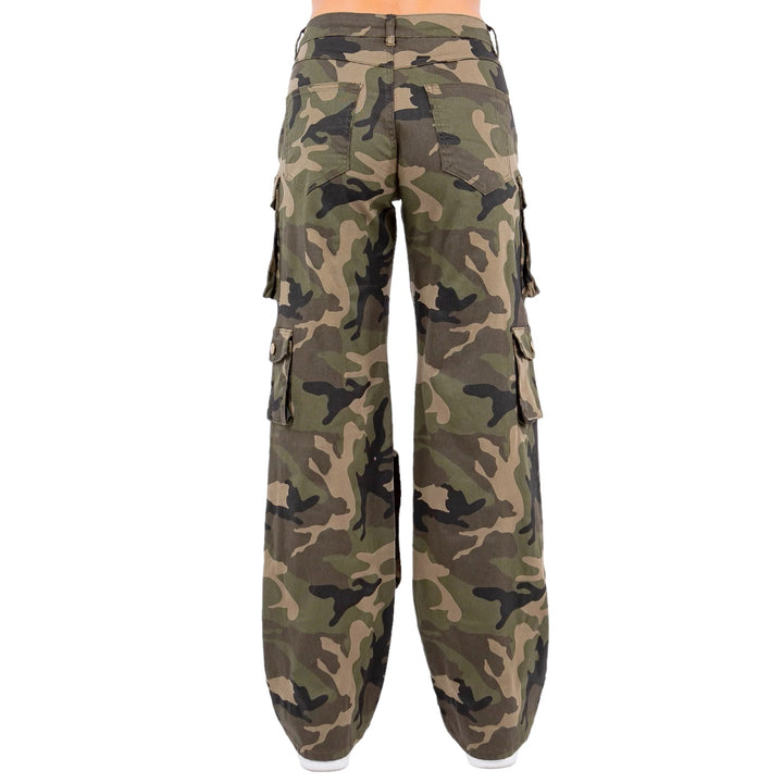 a woman wearing camouflage cargo pants