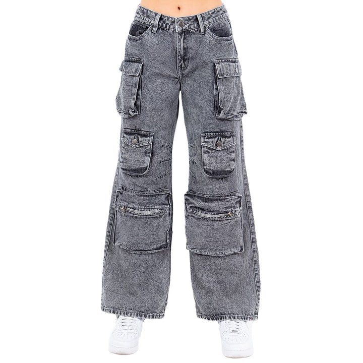 a woman wearing a pair of grey jeans