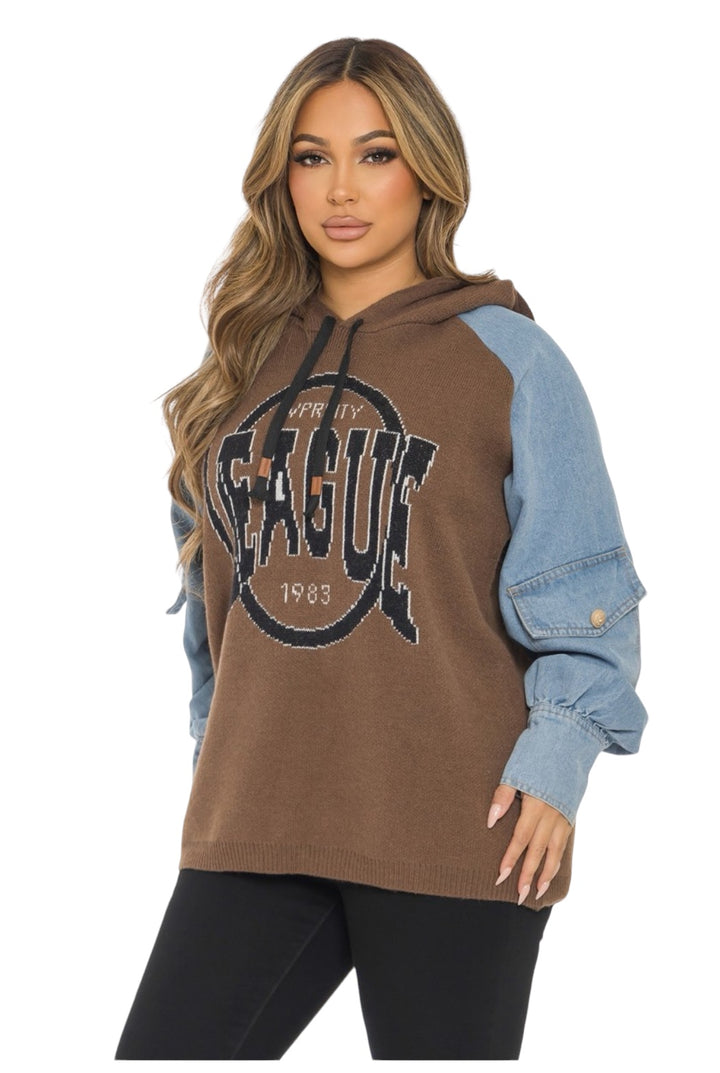 a woman wearing a brown and blue hoodie