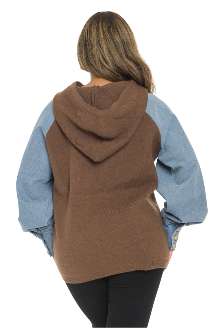 a woman wearing a brown and blue hoodie
