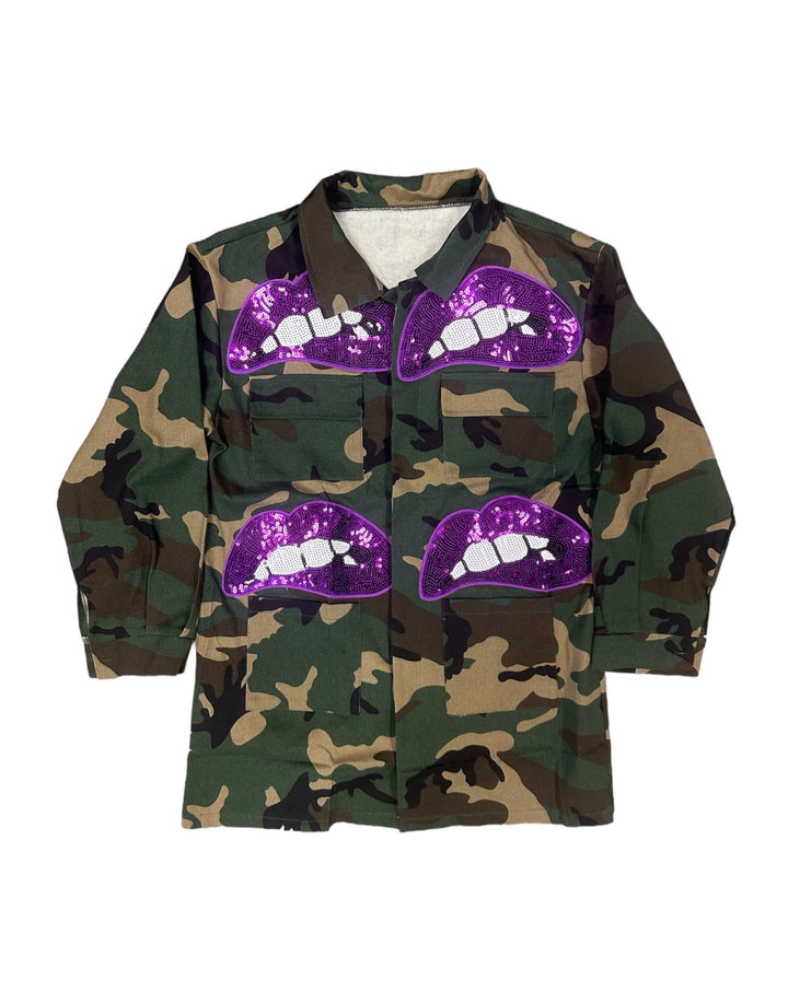 a camo jacket with purple lips on it