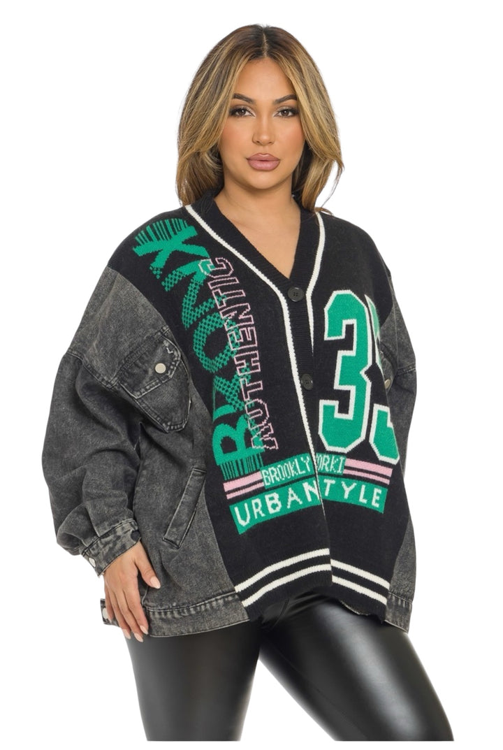 a woman wearing a black and green sweater