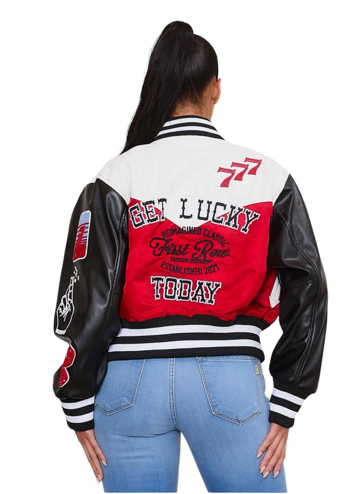 a woman wearing a red and white jacket