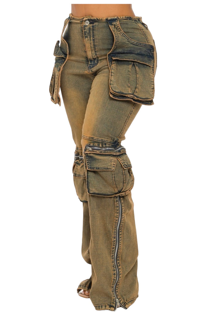 a woman wearing a pair of jeans with zippers
