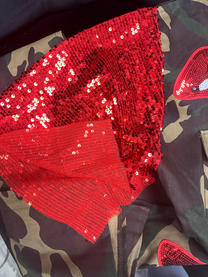 red sequins on a camo jacket