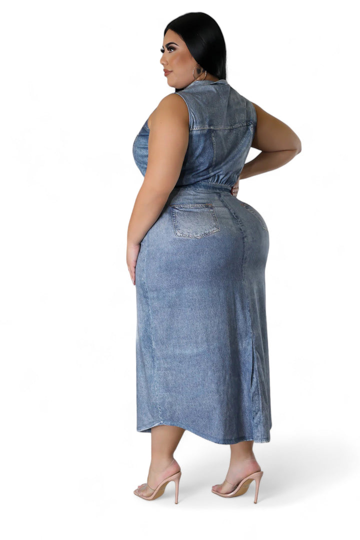 a woman wearing a denim dress and heels