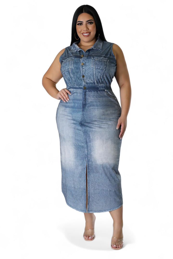 a woman wearing a denim dress with a high slit