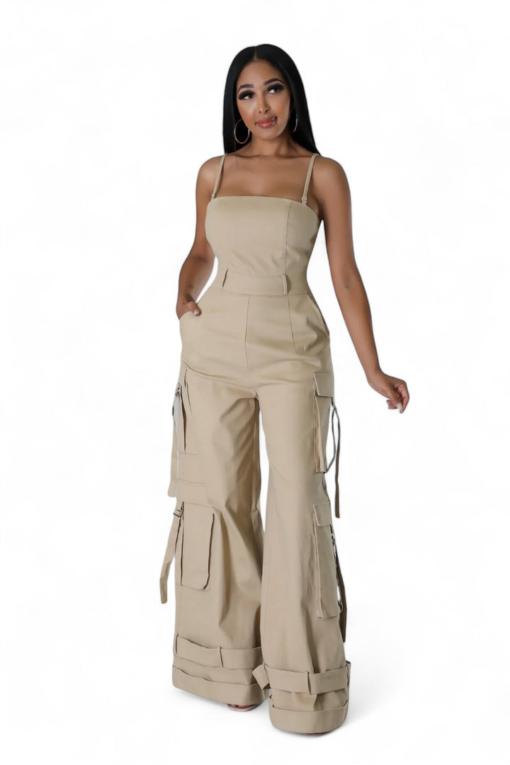 A Woman wearing a tan cargo jumpsuit