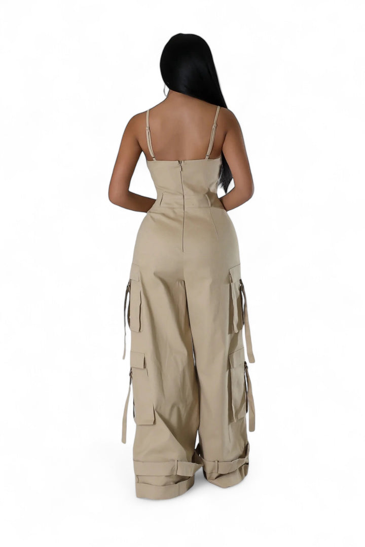 A Woman wearing a tan cargo jumpsuit