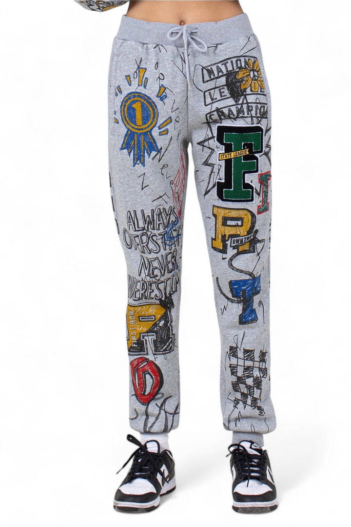 Front view of Allover Doodling Joggers with colorful patches