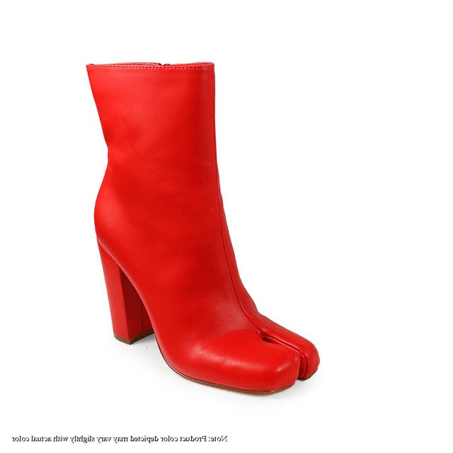 a pair of red high heeled boots on a white background