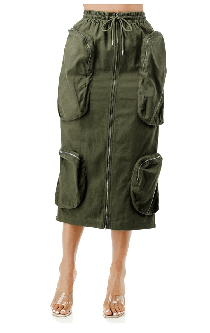 a woman wearing a green skirt with pockets