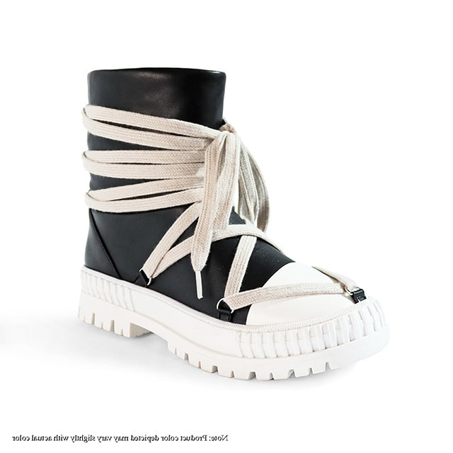 a pair of black and white shoes with laces