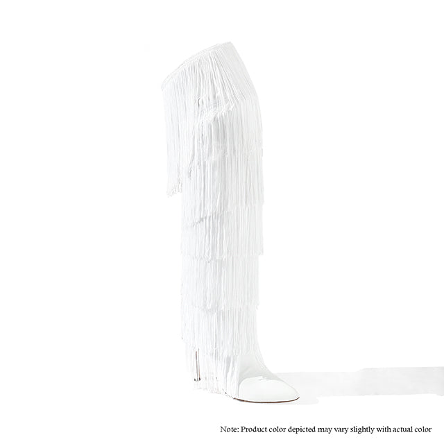 a tall white object with fringes on it