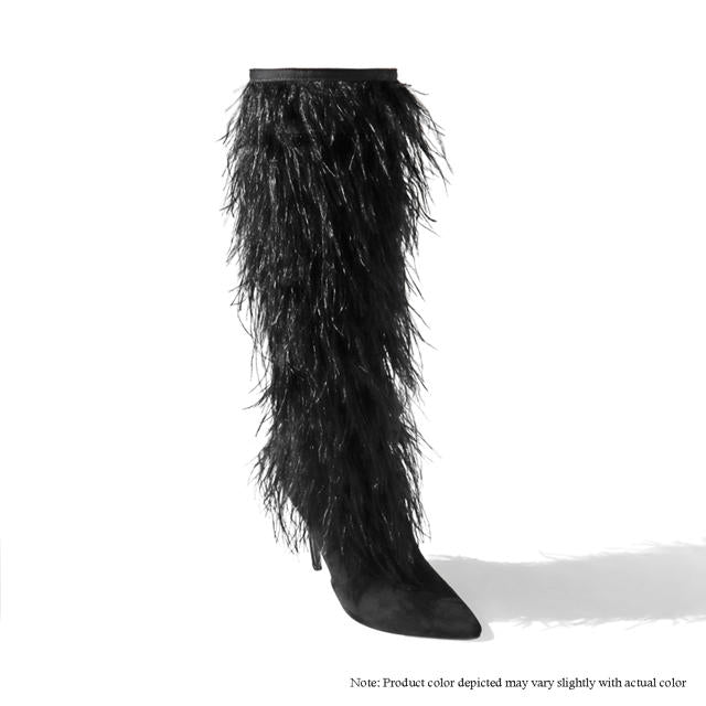 a pair of black boots with feathers on them