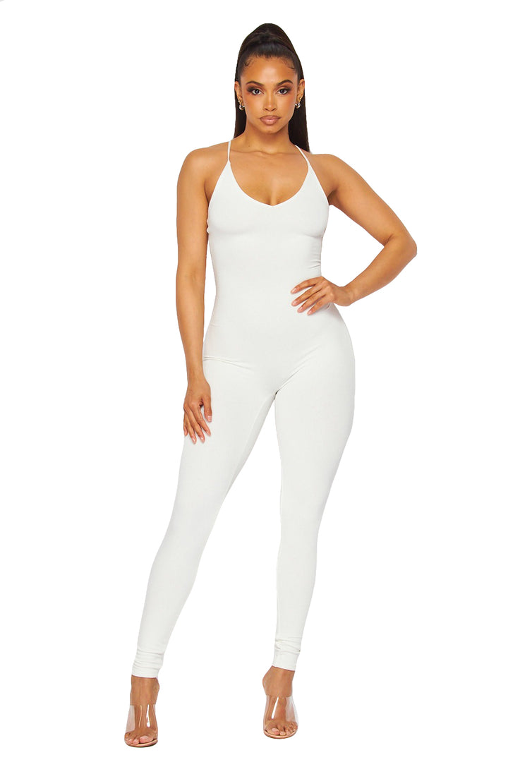 a woman in a white bodysuit