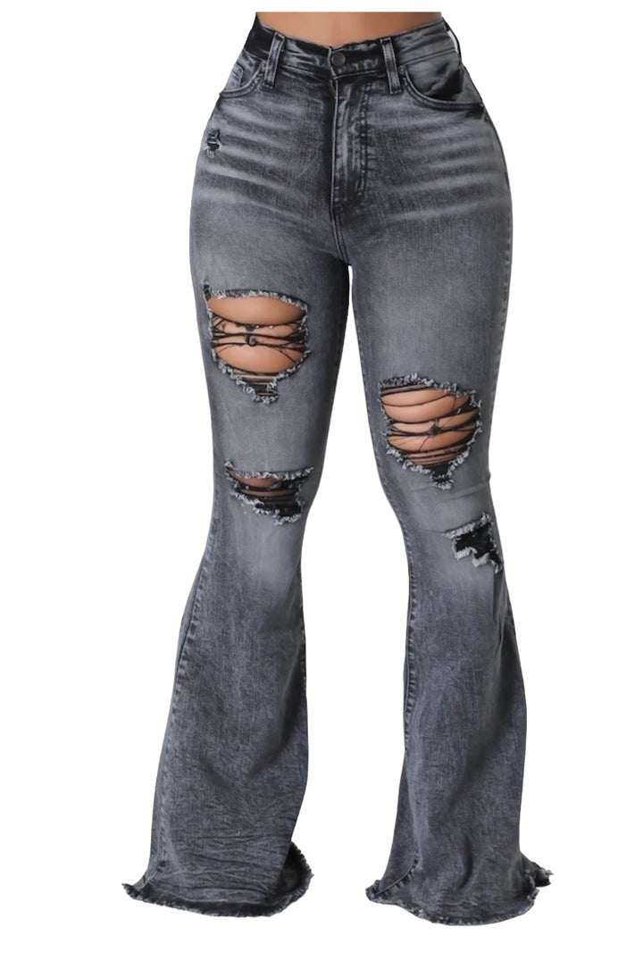 a woman wearing a pair of grey jeans