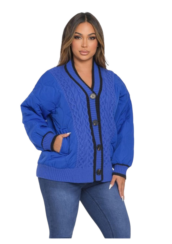 a woman wearing a blue sweater and jeans