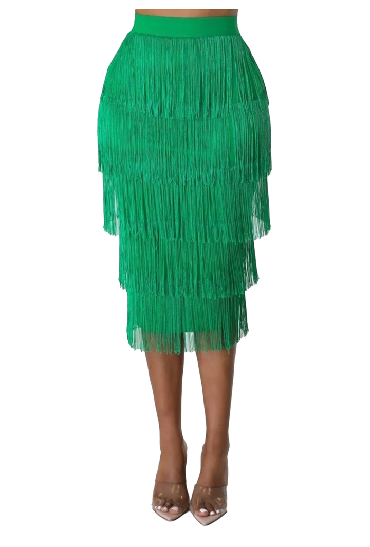 a woman wearing a green skirt with fringes