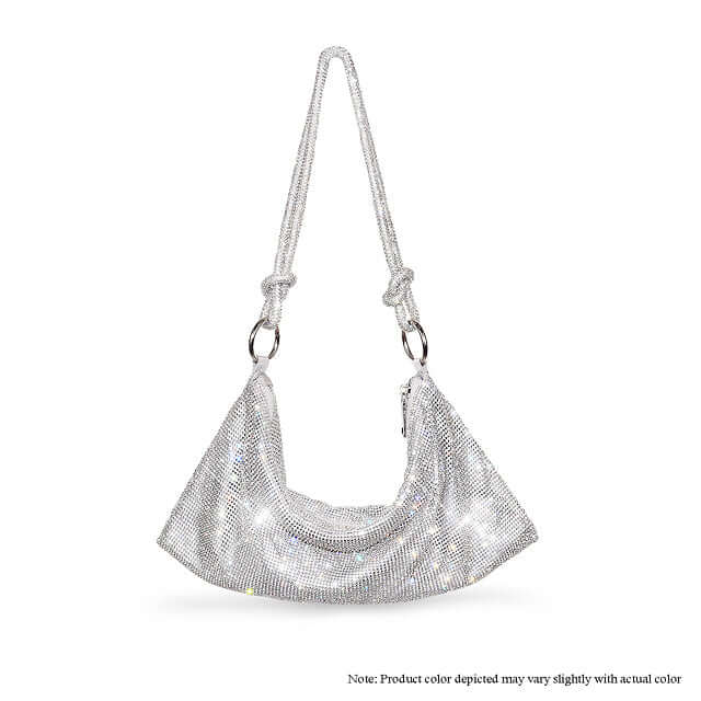 a white purse with a chain hanging from it