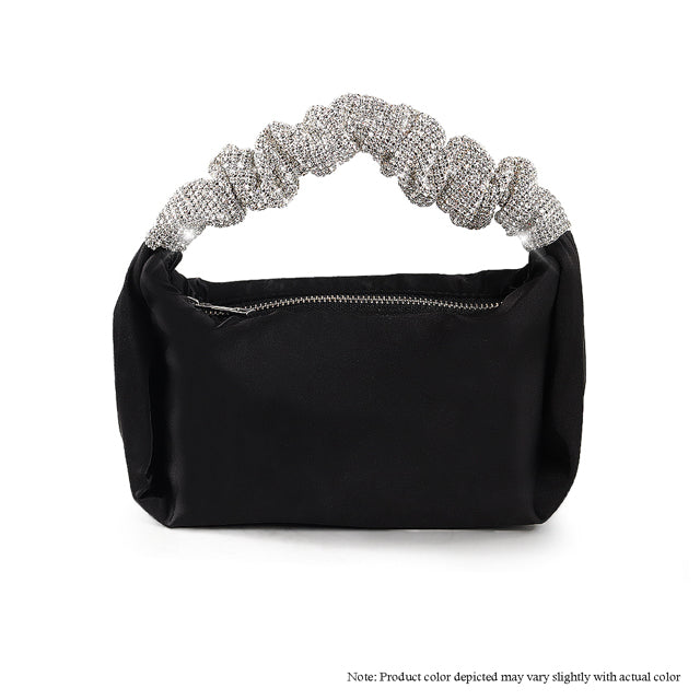 a black handbag with a knoted handle