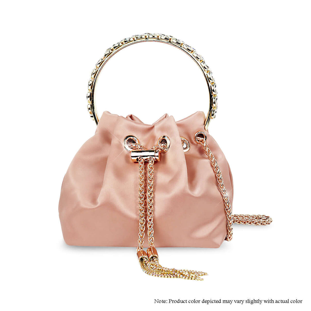 a pink purse with a gold chain handle