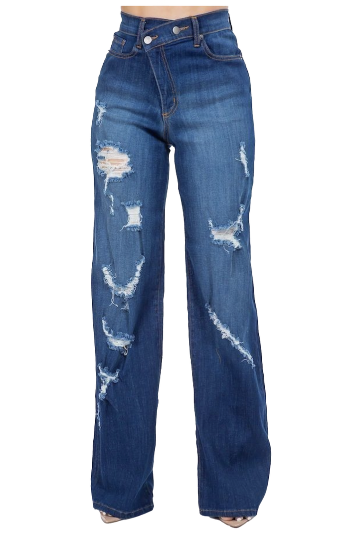 a woman wearing a pair of ripped jeans