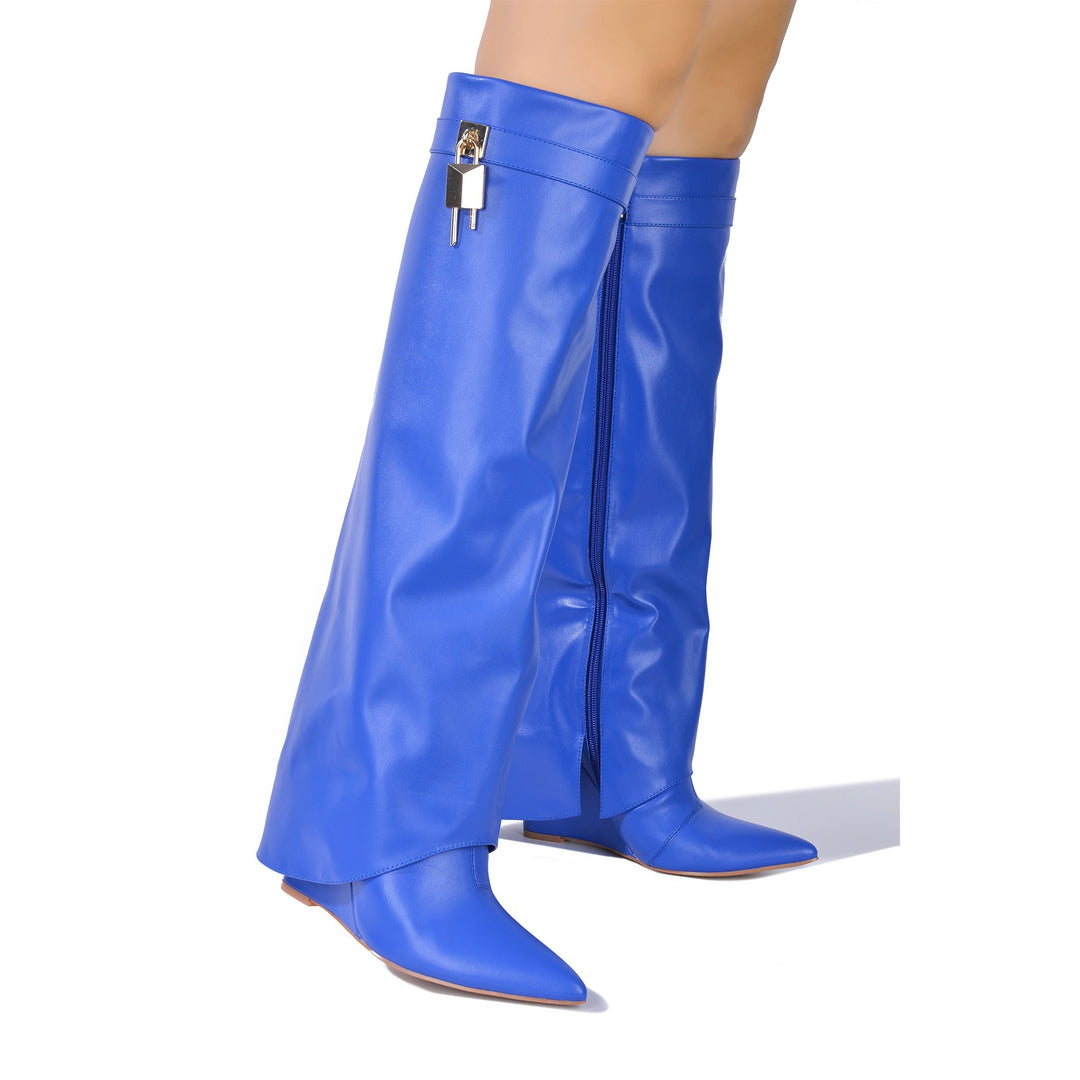 a close up of a person wearing blue boots