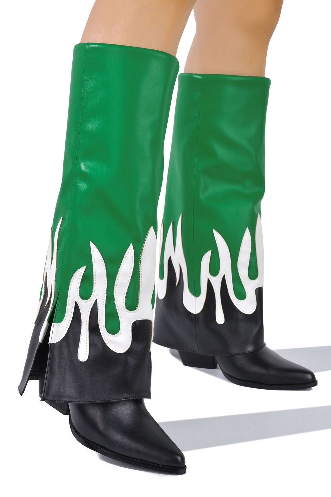 a pair of green and white boots with flames on them