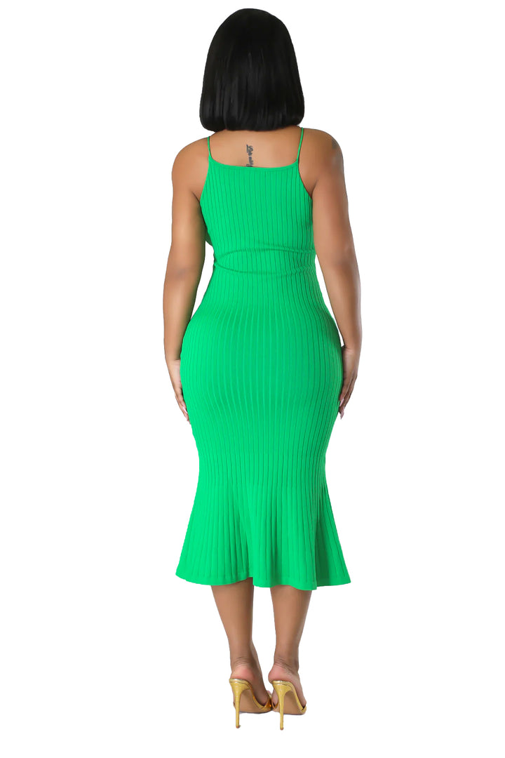 a woman in a green dress