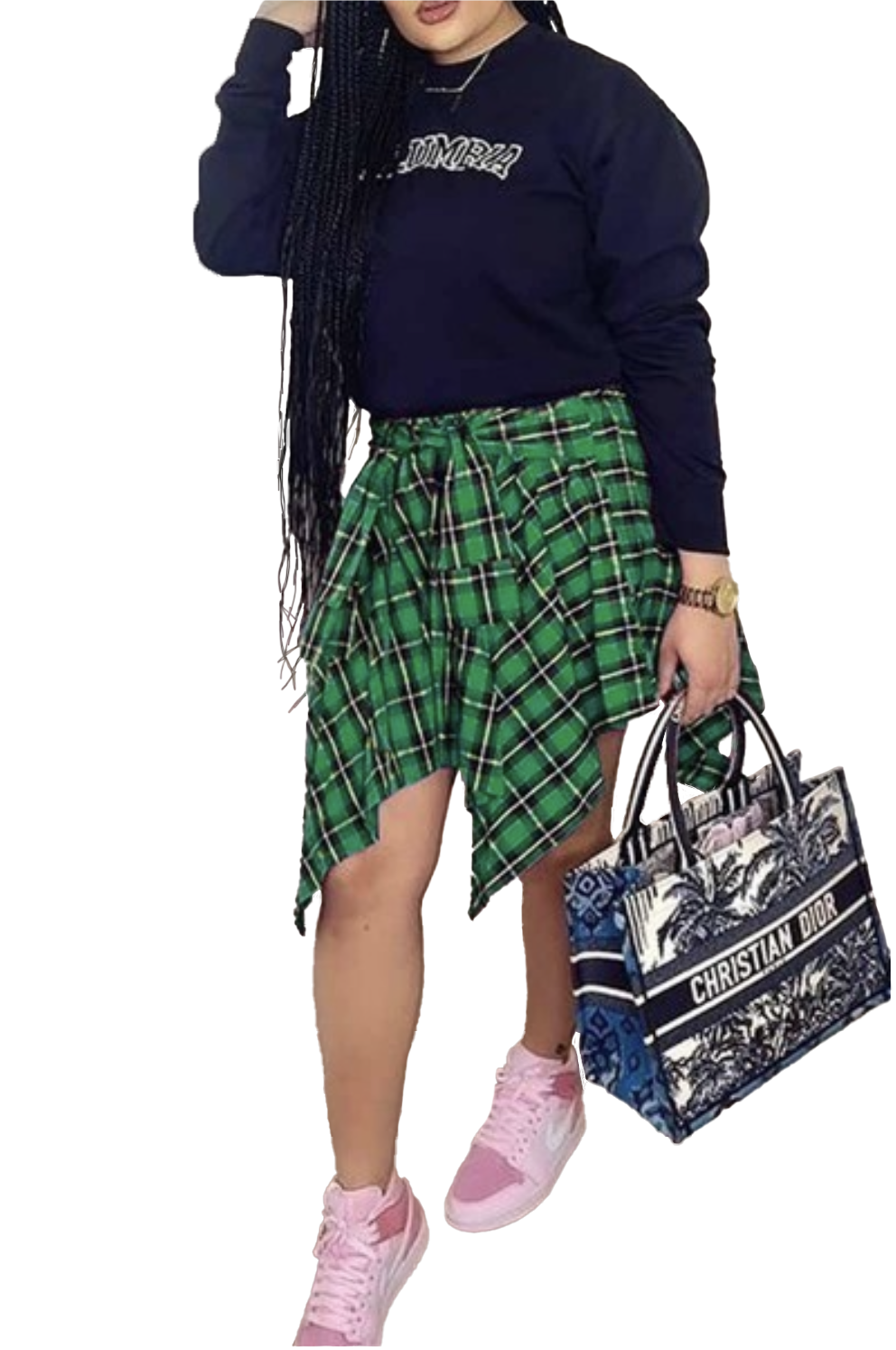 a woman in a black sweater and green plaid skirt