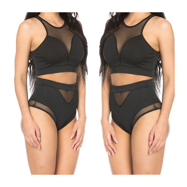 a woman in a black swimsuit with sheer sides