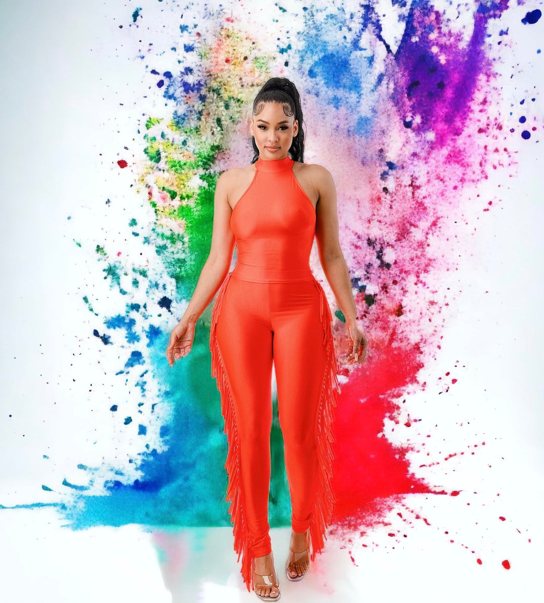 a woman in an orange jumpsuit posing for a picture
