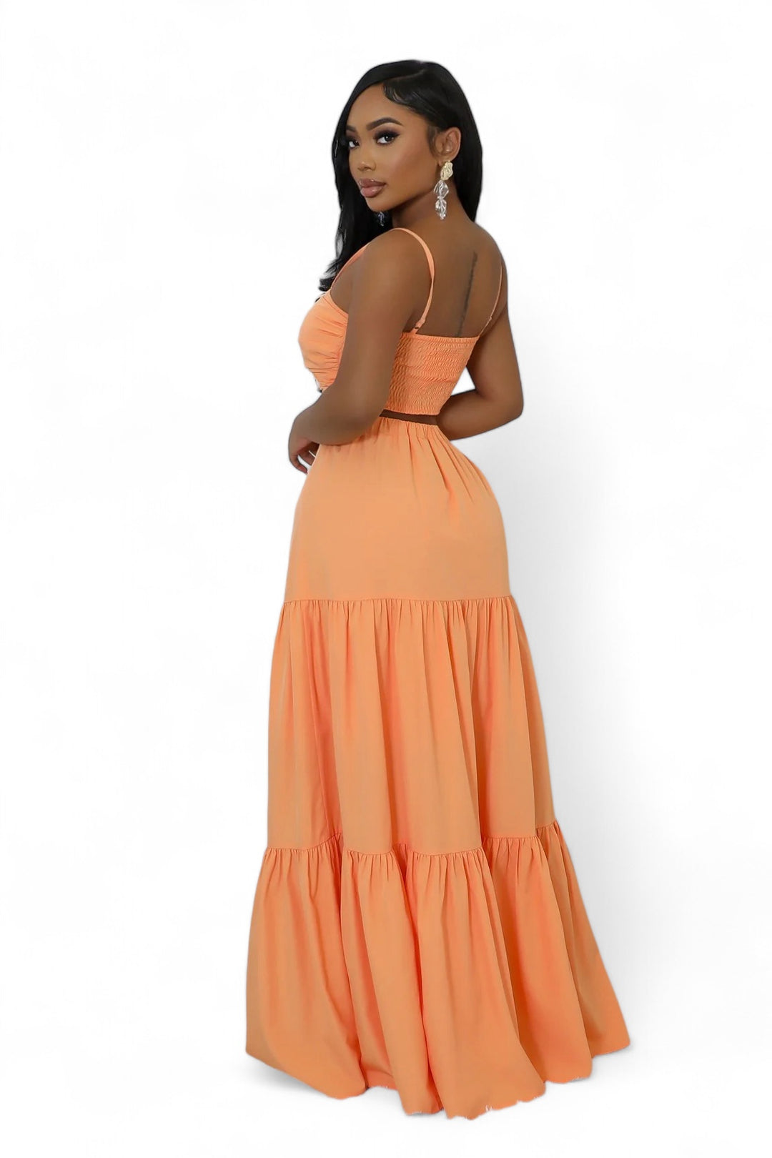 a woman in an orange dress