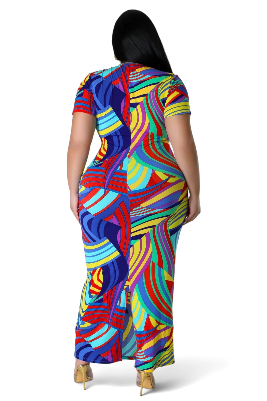 a woman wearing a multicolored abstract print dress